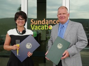 Sundance Vacations Co-Founders Accept Senate Citation for Company Milestone